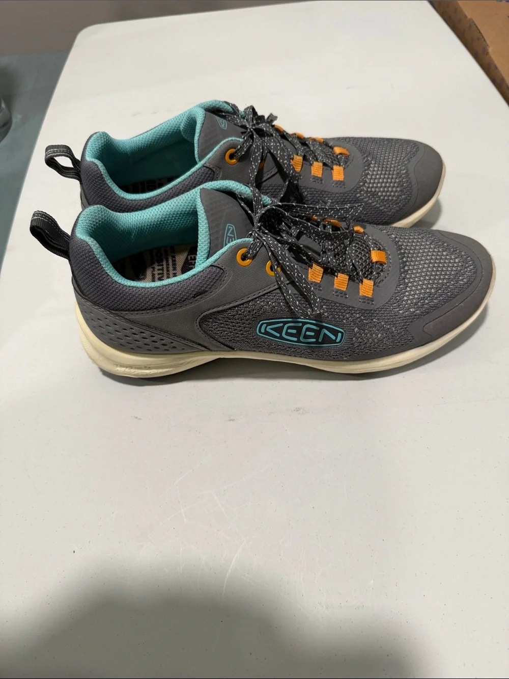 Keen Women’s Gray Sneakers with Teal Lining and Orange Accents